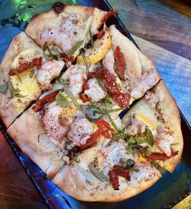 delicious flatbread topped with rock shrimp