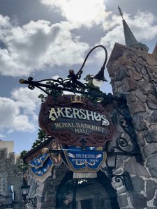 large wooden sign on a medieval style restaurant in Epcot